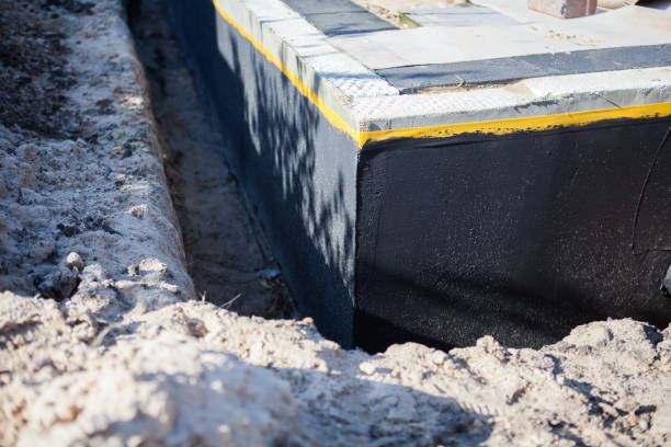 Professional Wet Basement Repair technician working in Medford, NJ